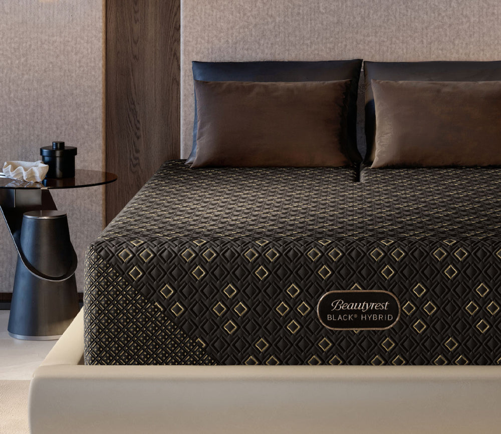 Close up of Beautyrest Black Hybrid Series 4 XCS Medium Mattress in a bedroom setting