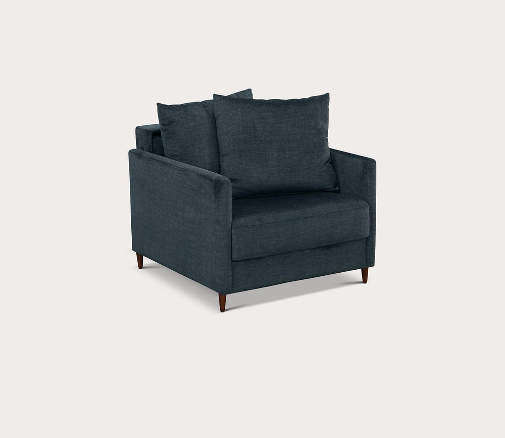 Emerald armchair with cushions on a white background