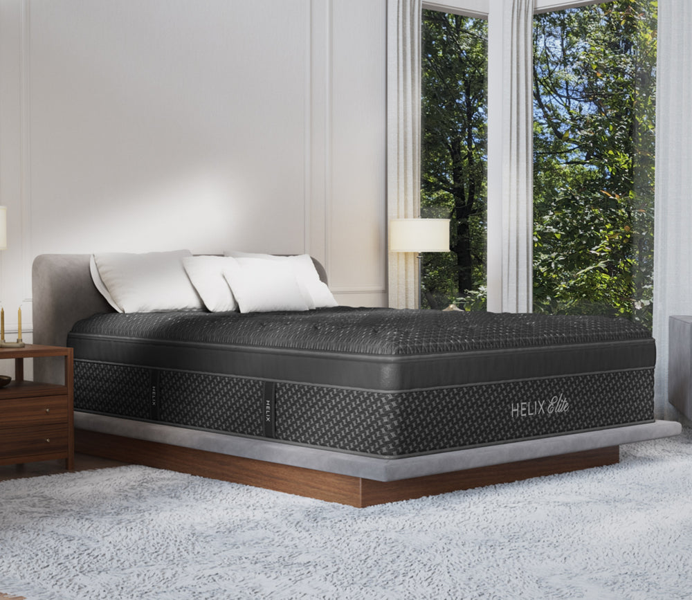 Helix Sunset Elite Mattress in a bedroom setting by a window