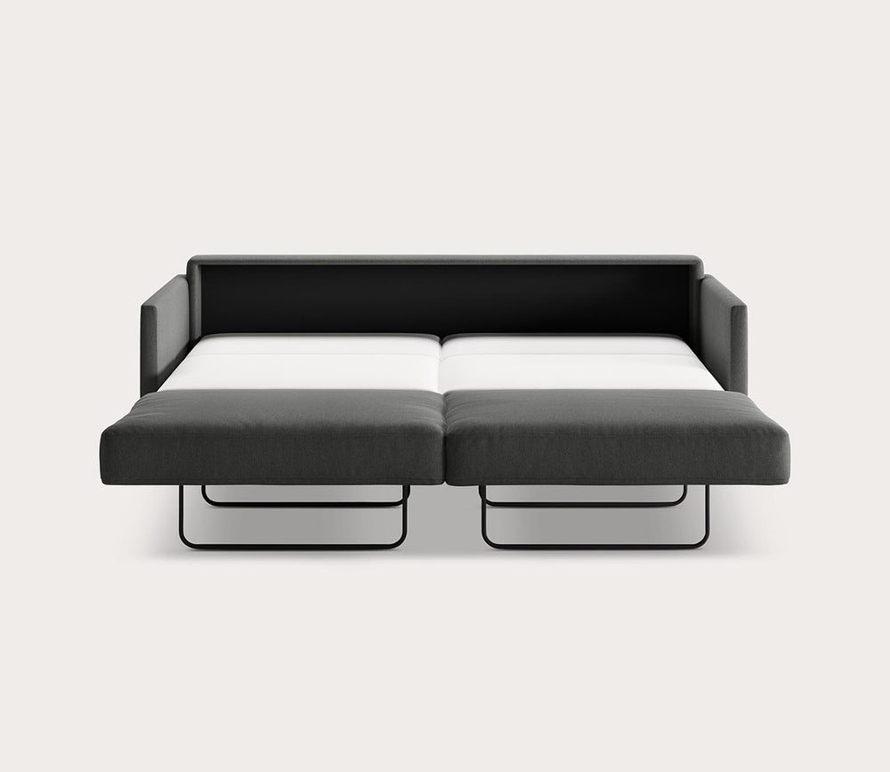 Black and white sectional sofa on a light gray background