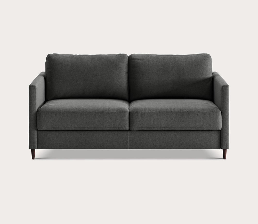 Gray sofa on a light beige background