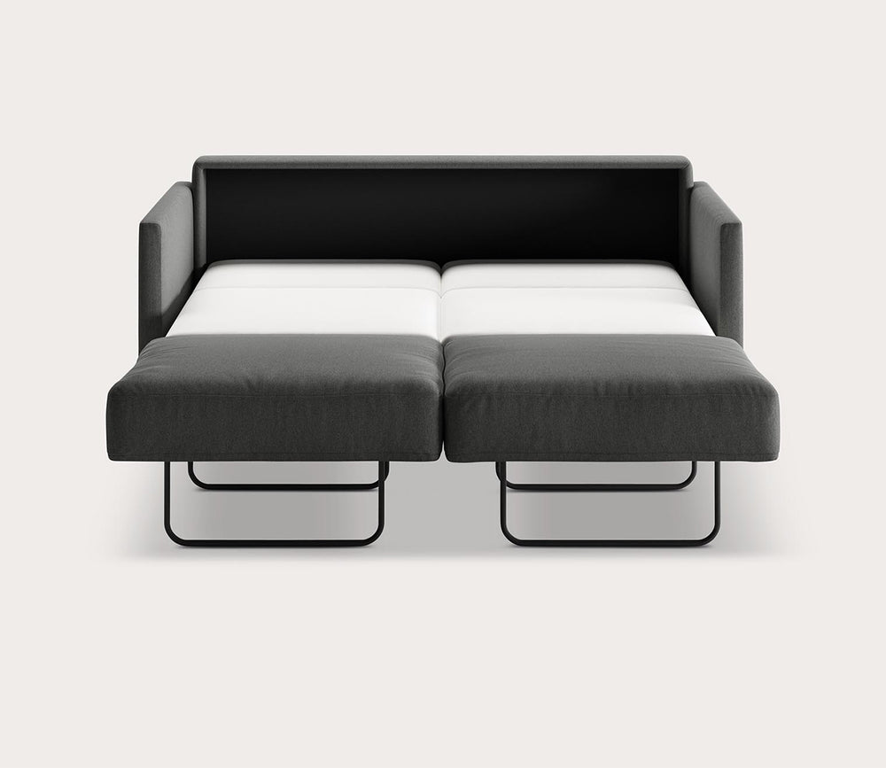 Black and white sofa bed on a light gray background