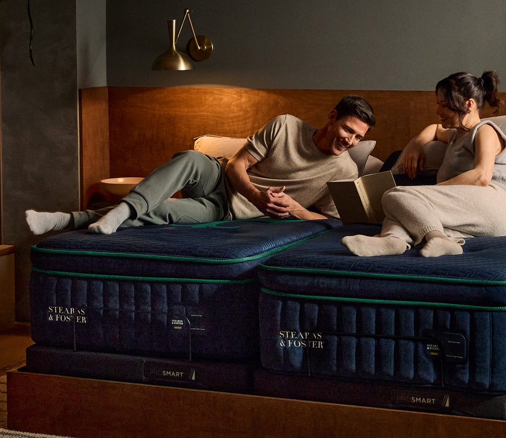 Man and woman resting on Stearns & Foster Reserve Firm Pillow Top II Mattress