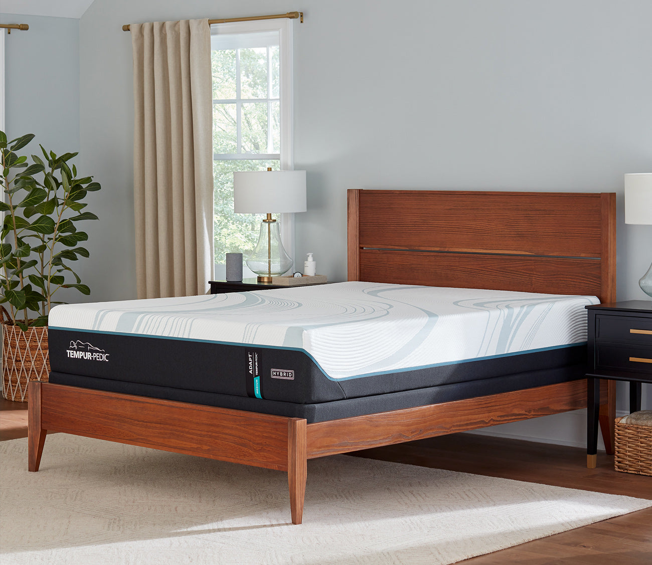 TempurPedic Adapt Medium Hybrid mattress in a bedroom setting