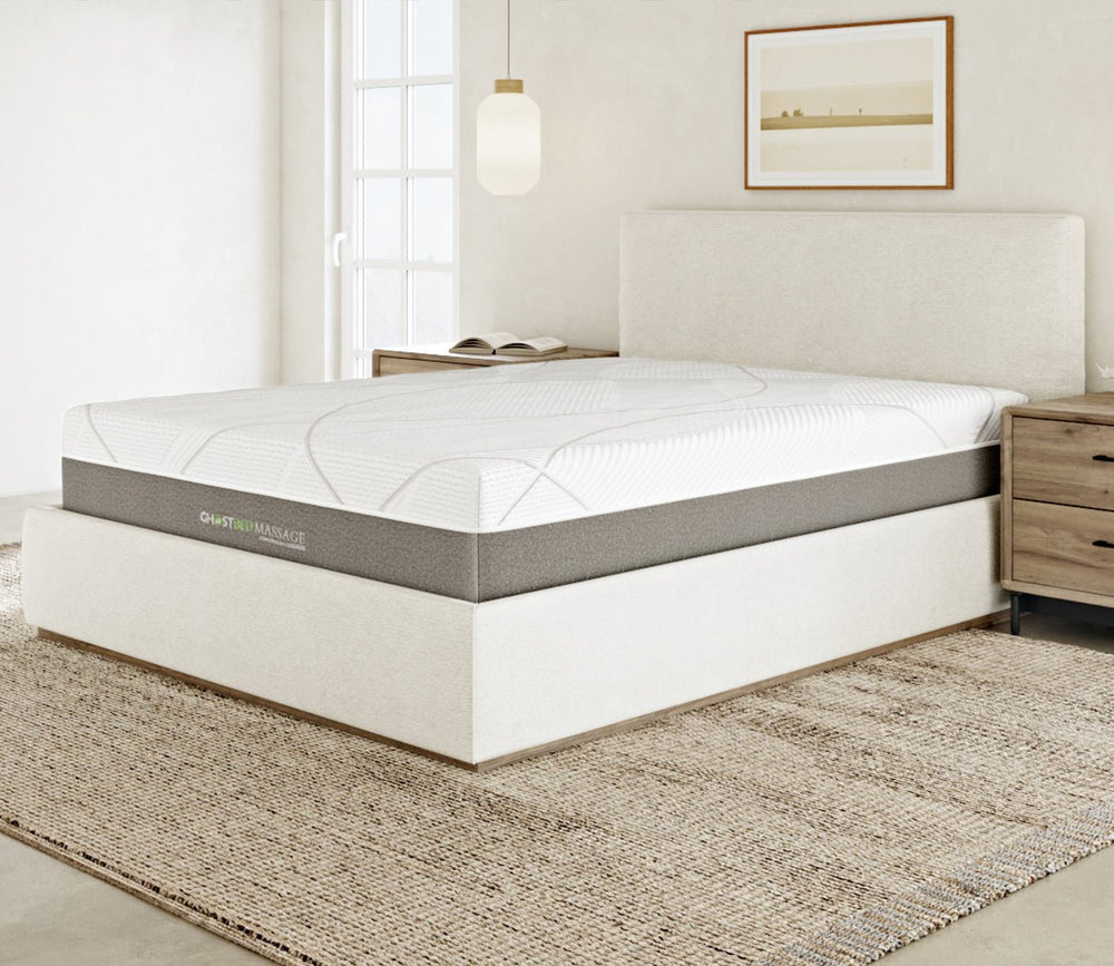 GhostBed Massage Hybrid Mattress in a bedroom featured with an upholstered bed