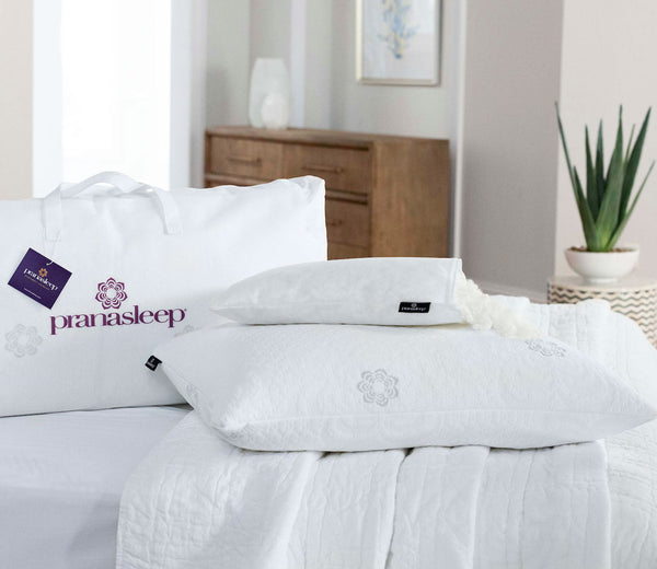PranaSleep Dharma Adjustable Latex Pillow by PranaSleep, roomscene showing pillow, extra fill pack annd cover