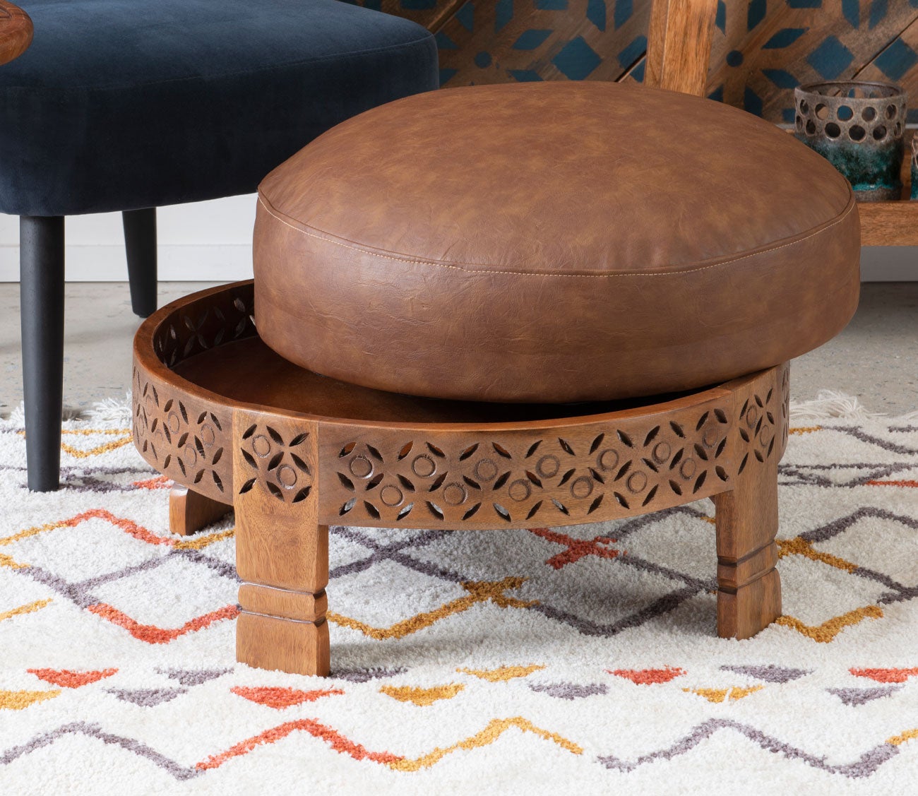 Taini Brown Leatherette Round Wood Ottoman by Powell